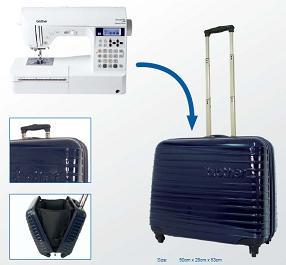 modrý cestovní kufr na kolečkách pro šicí stroje